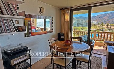 Departamento y piscina temperada frente al mar en Papudo