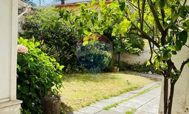 Amplio departamento con hermoso jardin