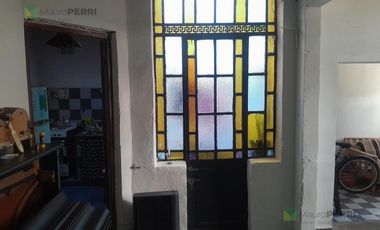 Casa en  en venta y local comercial calle 12 e  70 y 71 La Plata