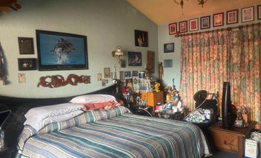 Casa sobre corredor jinetes