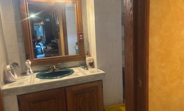 Casa sobre corredor jinetes