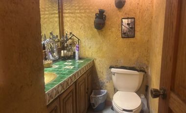 Casa sobre corredor jinetes