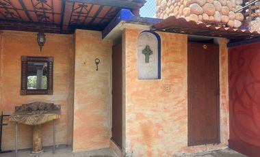 Casa sobre corredor jinetes