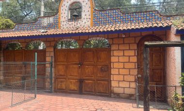 Casa sobre corredor jinetes