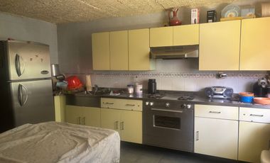 Casa sobre corredor jinetes