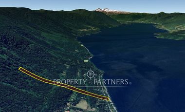 Espectacular terreno 4,9 Ha. con Casa orilla lago Riñihue