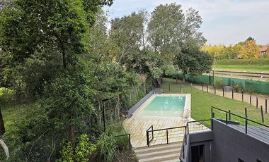 Venta con renta Depto 3 ambientes c/balcón y 2 cocheras Pilar La lonja