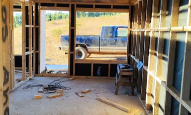 Parcela Casa Semi terminada con 5000 M2