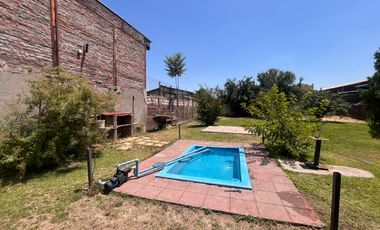 TERRENO AMPLIO CON VIVIENDA Y POTENCIAL PRODUCTIVO