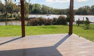 Depto PB con jardin al rio, 3 dormitorios y dependencia - Dos cocheras- con renta h/ 04/26