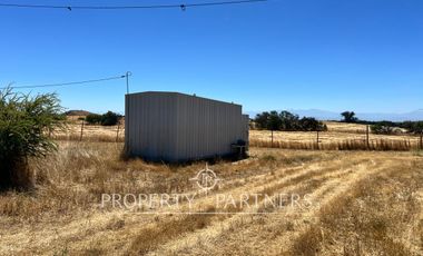 Gran campo agrícola cercano a Retiro