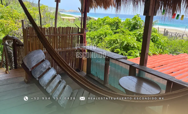 Terreno Frente al Mar con Cabañas Ecológicas