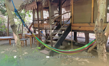 Terreno Frente al Mar con Cabañas Ecológicas