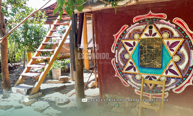 Terreno Frente al Mar con Cabañas Ecológicas