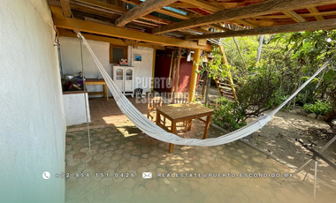 Terreno Frente al Mar con Cabañas Ecológicas