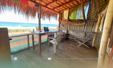Terreno Frente al Mar con Cabañas Ecológicas
