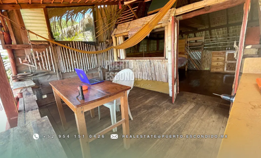 Terreno Frente al Mar con Cabañas Ecológicas