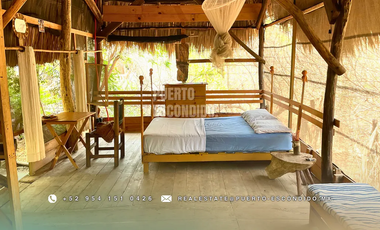 Terreno Frente al Mar con Cabañas Ecológicas