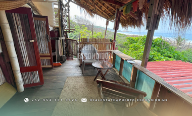 Terreno Frente al Mar con Cabañas Ecológicas