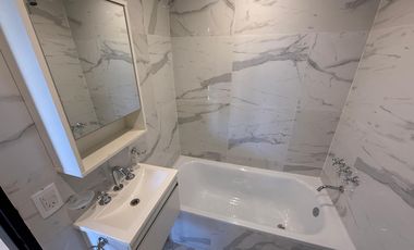 Departamento dos ambientes con patio a la venta en Wilde