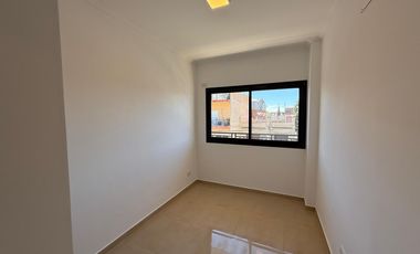 Departamento dos ambientes con patio a la venta en Wilde