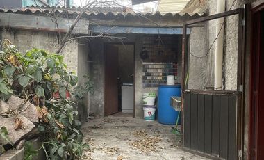 Terreno con Construcción, ideal como taller ó como Inversion