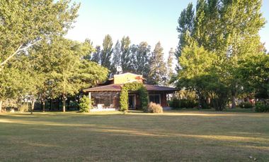 Chacra de 7 hectáreas con importantes mejoras