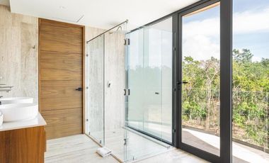 Villa lujosa de 3 habitaciones en venta en Tulum con entrega inmediata | Rooftop, alberca y gym