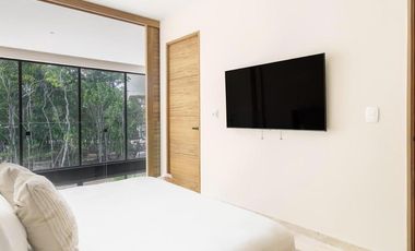 Villa lujosa de 3 habitaciones en venta en Tulum con entrega inmediata | Rooftop, alberca y gym