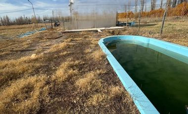 Terreno con pileta y platea terminada