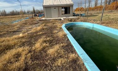 Terreno con pileta y platea terminada