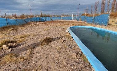 Terreno con pileta y platea terminada
