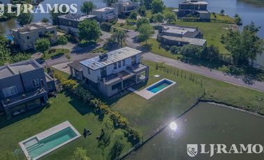 Casa en Venta con renta a la Laguna Barrio Islas El Canton A Estrenar