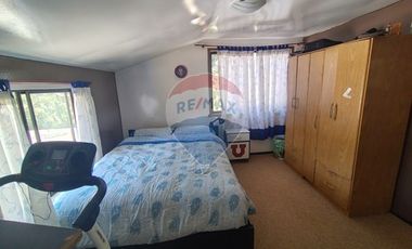 Gran parcela con tres casas en Valdivia.