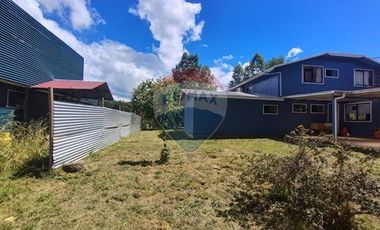 Gran parcela con tres casas en Valdivia.