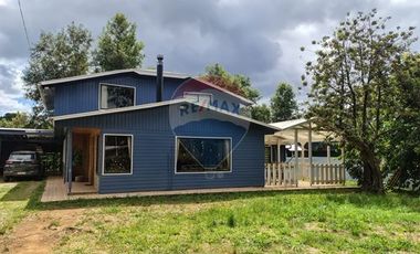 Gran parcela con tres casas en Valdivia.