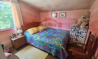 Gran parcela con tres casas en Valdivia.