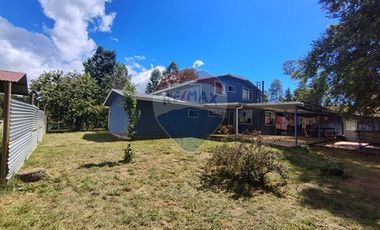 Gran parcela con tres casas en Valdivia.