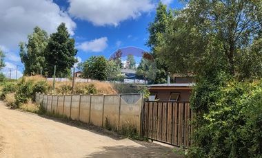 Gran parcela con tres casas en Valdivia.