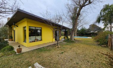 Casa de 1 dormitorio en dos terrenos y pileta  en Country Club Logaritmo
