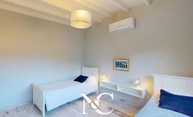 Casa en venta en Costa Esmeralda con fondo libre arbolado