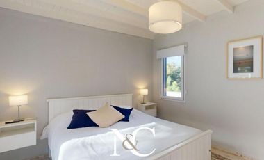 Casa en venta en Costa Esmeralda con fondo libre arbolado