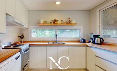 Casa en venta en Costa Esmeralda con fondo libre arbolado