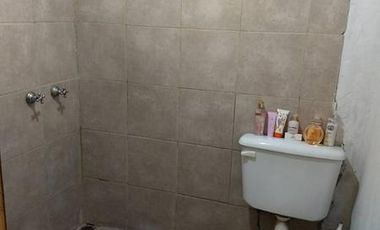 Propiedad con 2 viviendas y un departamento   en venta en G Catan