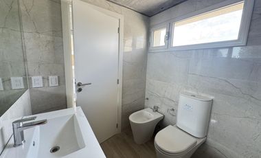 Venta - Departamento de dos dormitorios con balcón y amenities en Condominios Bagua, Funes