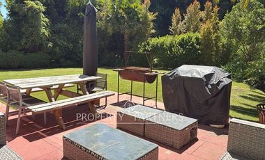 Departamento en Primer piso con amplio jardín