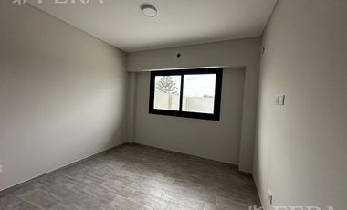 Venta de Departamento 2 ambientes con patio y cochera en Villa Dominico