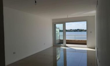 4 ambientes    2 cocheras .Excelente funcionalidad, estar y suite con balcón corrido a laguna.