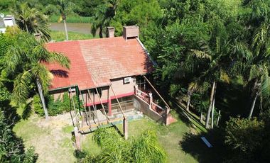 Casa exclusiva con bajada al río en Country Ubajay