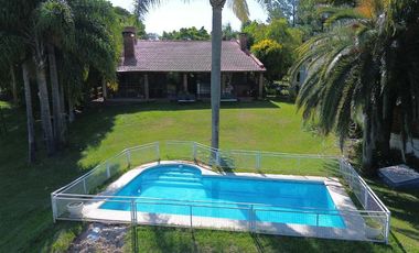 Casa exclusiva con bajada al río en Country Ubajay